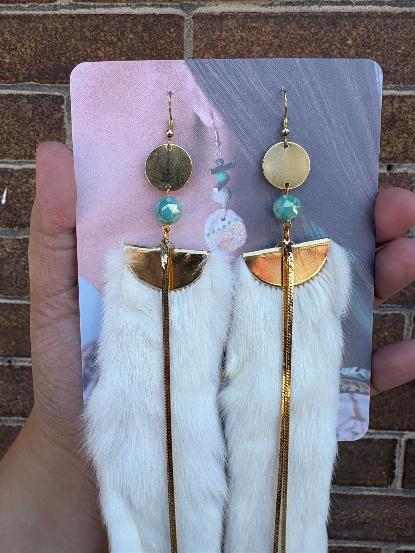 Ermine Earrings adorned with Gold