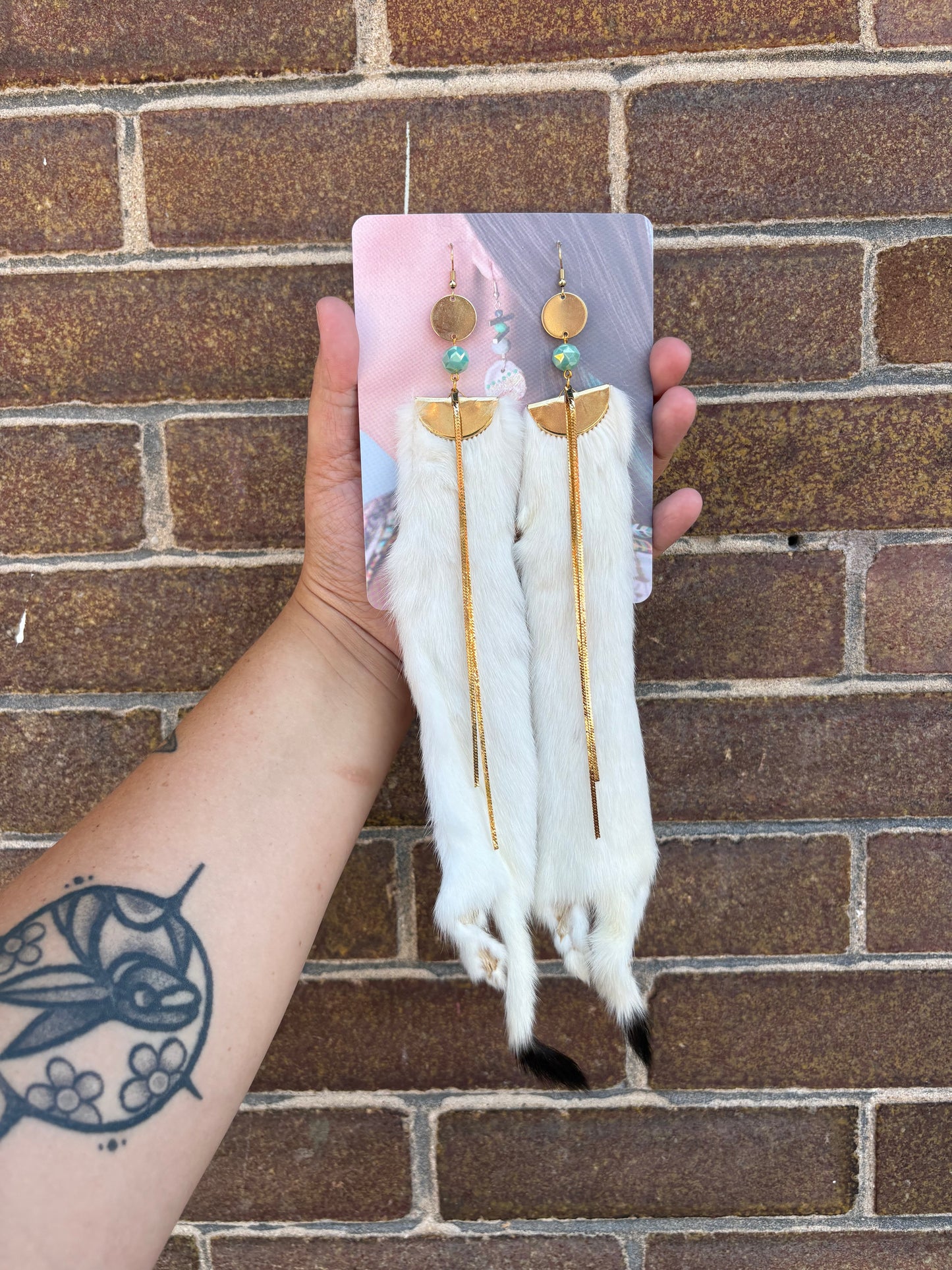 Ermine Earrings adorned with Gold
