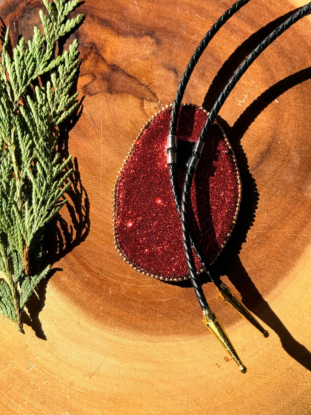 Flat Stitch Fiery Dice Bolo Tie by Sinew and Sole