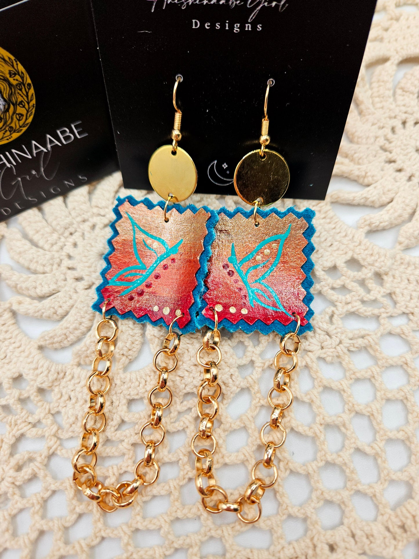 Parfleche Butterfly Painted Earrings on Teal leather